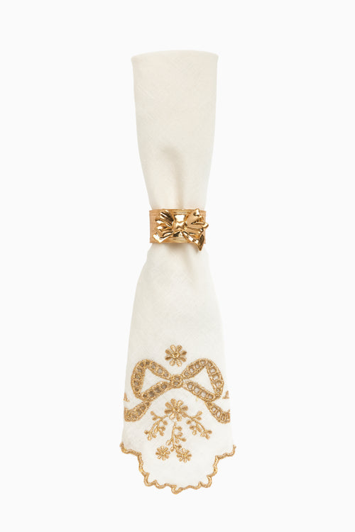 White napkin set of 4 with gold ribbon knot and embroidered winter motif