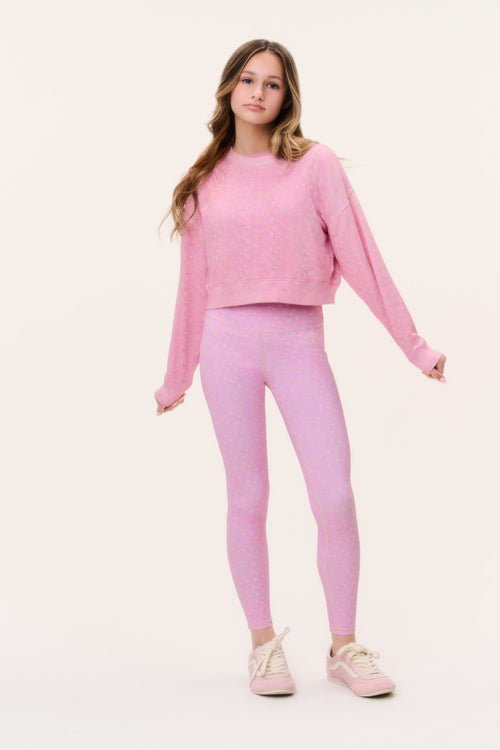 Girls' pink ditsy floral highland leggings, front view full length
