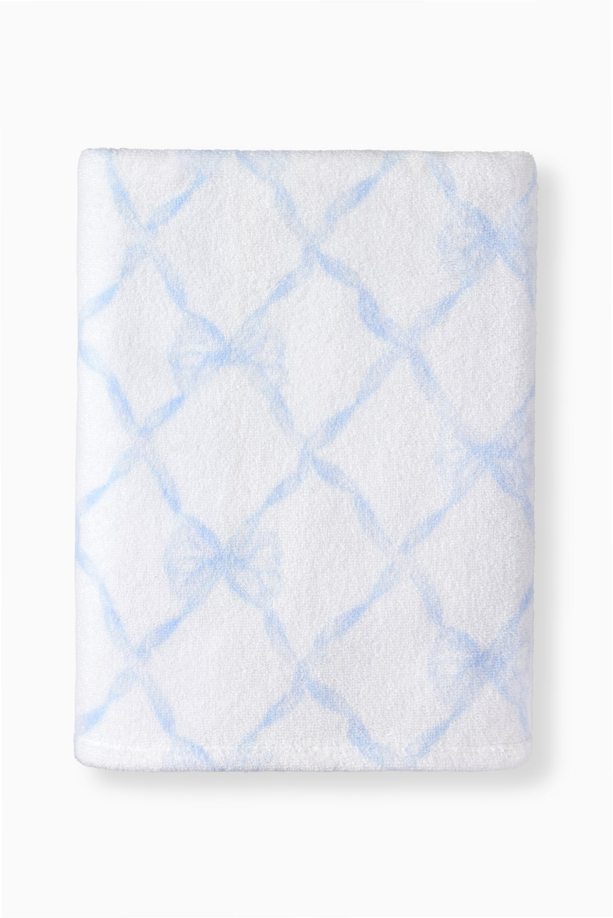 White bath towel with light blue diamond lattice print