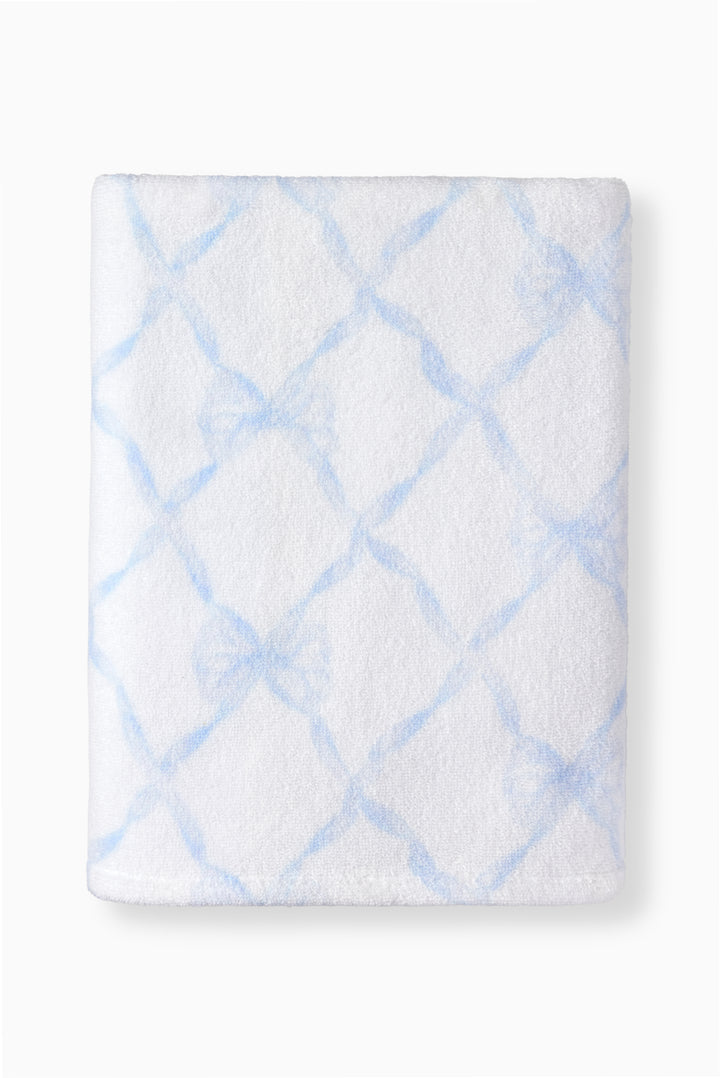 White bath towel with light blue diamond lattice print