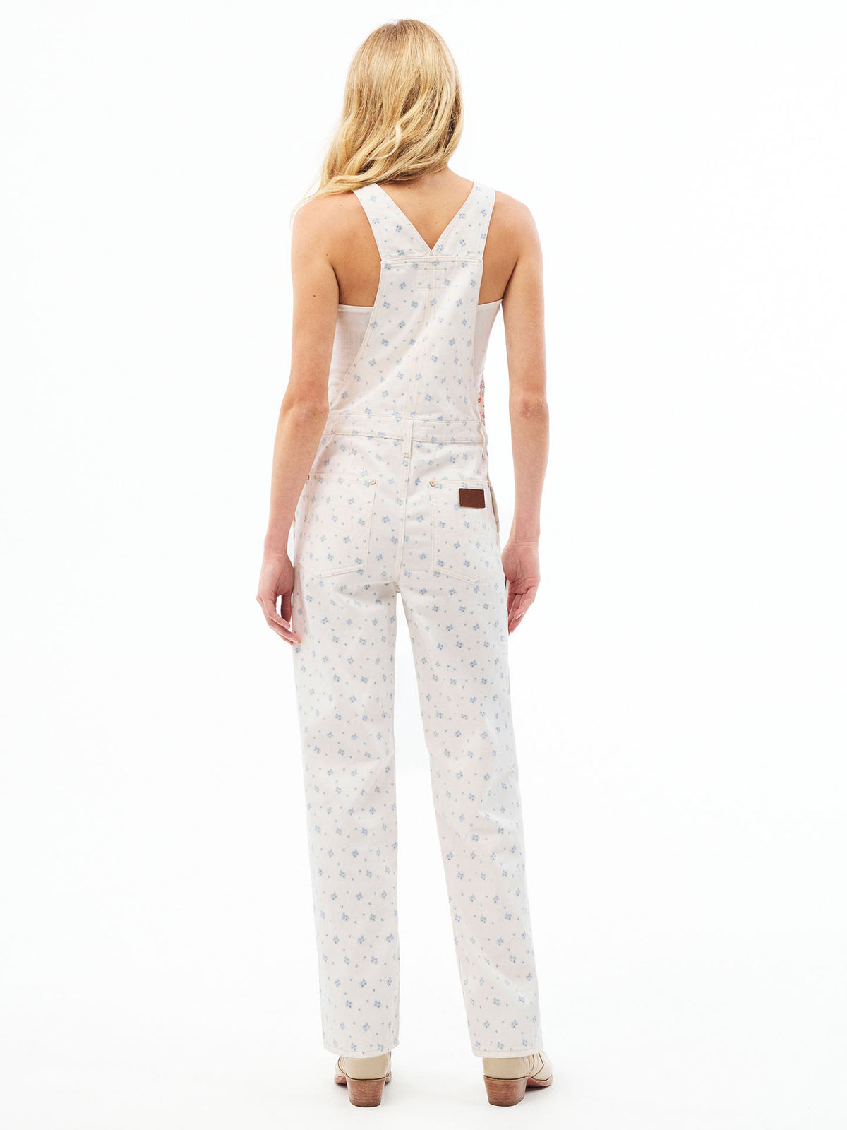 Women’s ecru patterned overall from behind with V-back straps and leg seams