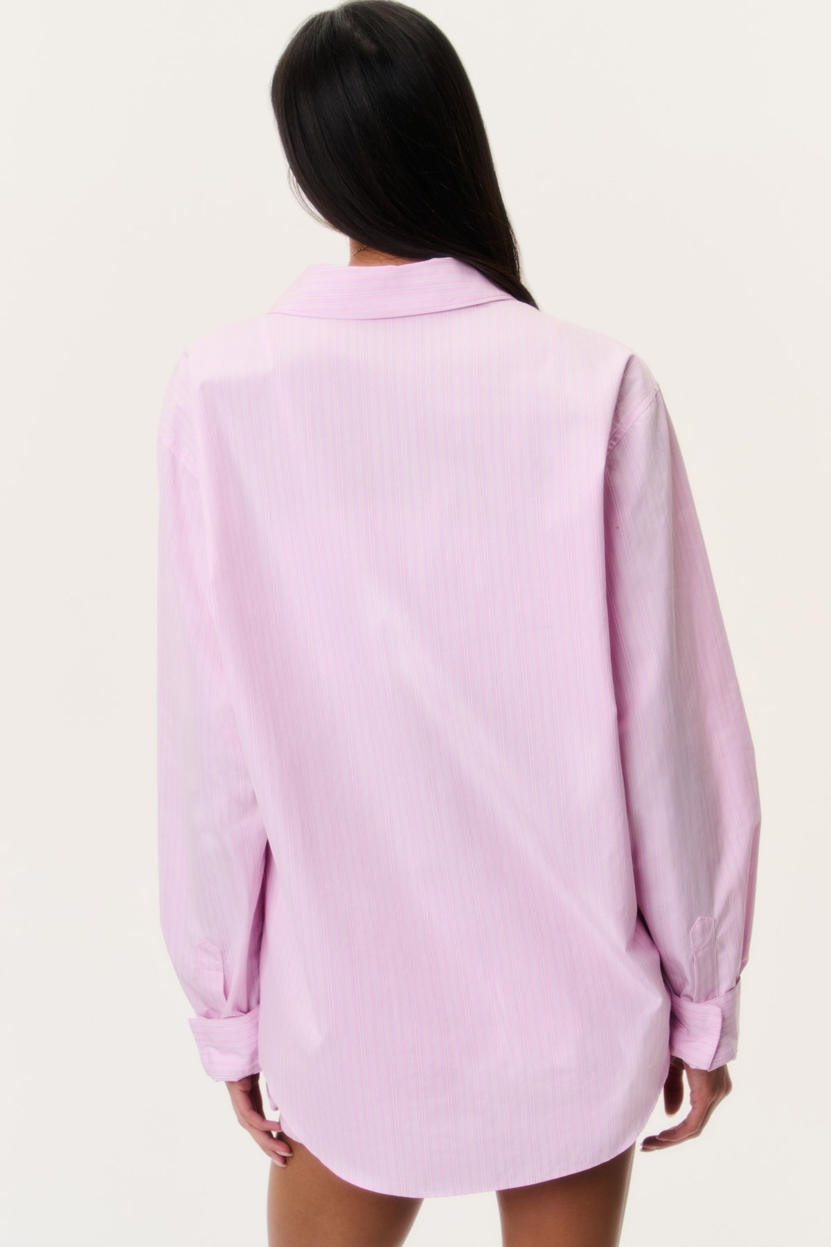 Pink pinstripe unisex button-up shirt, back view with long sleeves