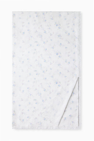 Cotton beach throw with small light-blue starfish pattern on white