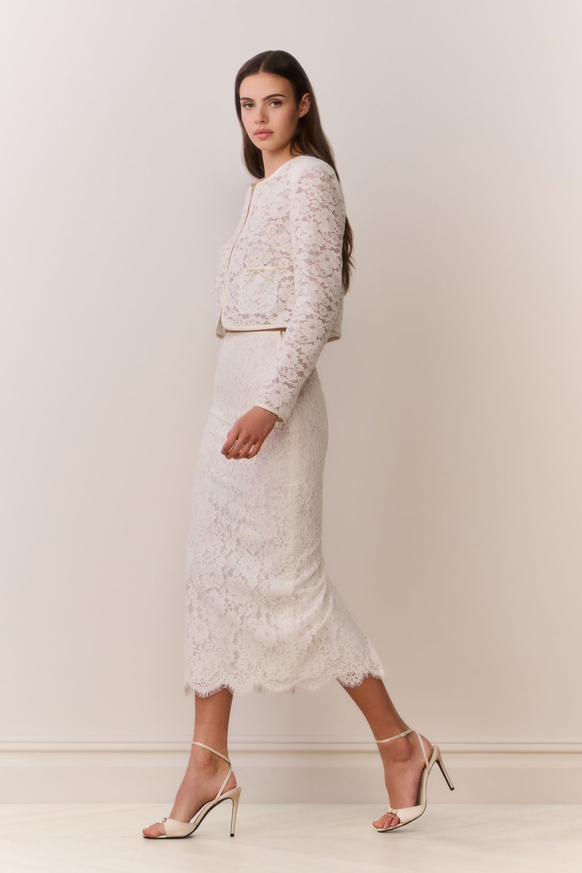 Ivory lace midi pencil skirt with fine floral lace texture