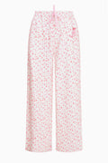 Pink ditsy floral sweatpants with elastic waist and drawstring, wide straight legs