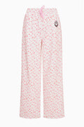Ilyra sweatpants with pink speckle print, drawstring waist, side button detail, wide legs