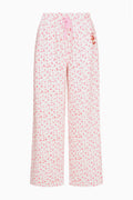 Pink ditsy floral sweatpants with elastic waistband and drawstring, loose wide legs