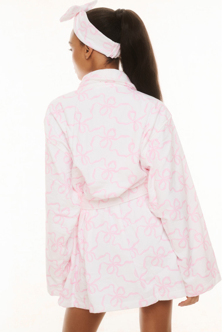 Pink floral print cotton bath robe with tie belt, shown from back with headband