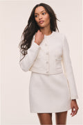 Ivory tweed jacket with button-front and flap pockets, 3/4 front view