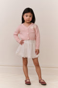 Girls pink cardigan with bow embroidery and button front, paired with white lace skirt