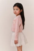 Girls pink bow-embroidered cardigan with button front and long sleeves, side view