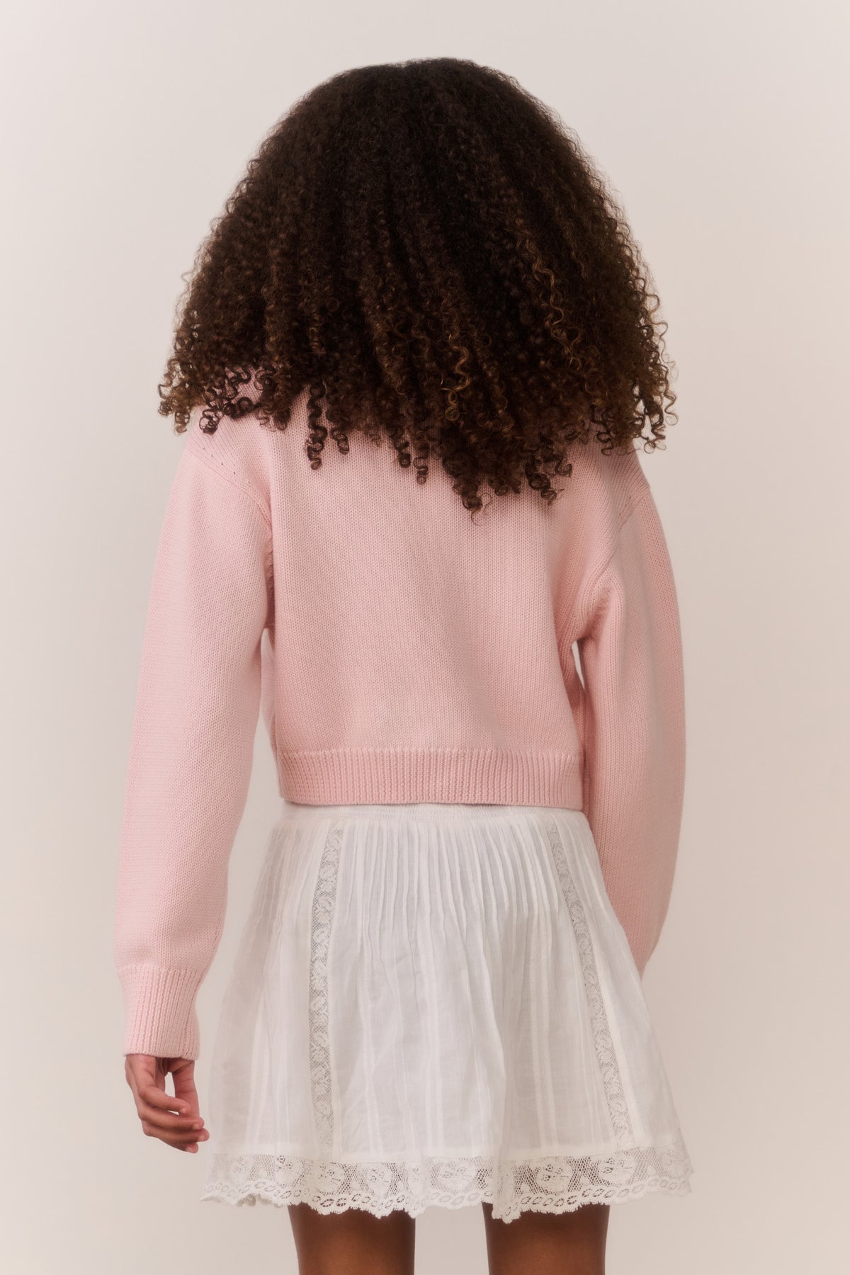 Pink knit cardigan, bow embroidery on upper back, ribbed cuffs and hem