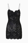 Black embellished lace mini dress with spaghetti straps and scalloped hem