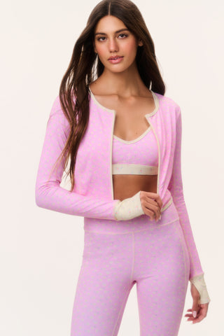 Pink patterned cropped active jacket with open zipper and long sleeves