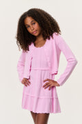 Tween pointelle cardigan, light pink button-front and pointelle knit with ruffle hem