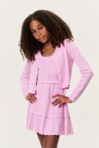 Tween pointelle cardigan, light pink button-front and pointelle knit with ruffle hem