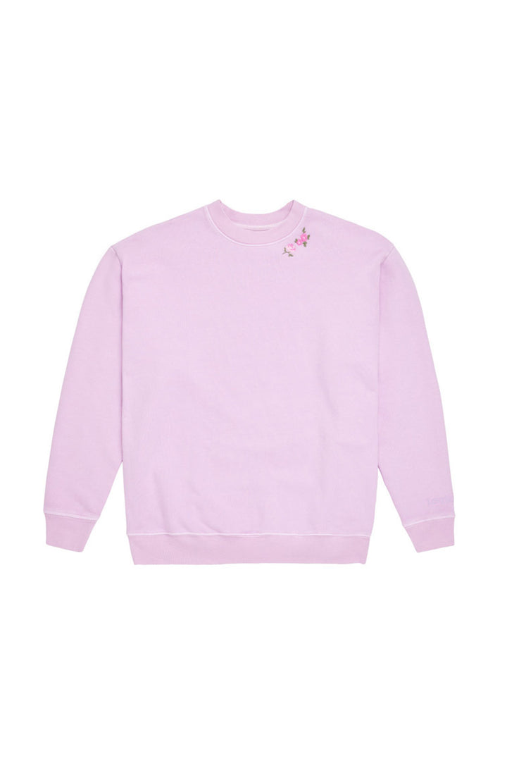 Lavender crewneck pullover sweatshirt with small floral chest graphic
