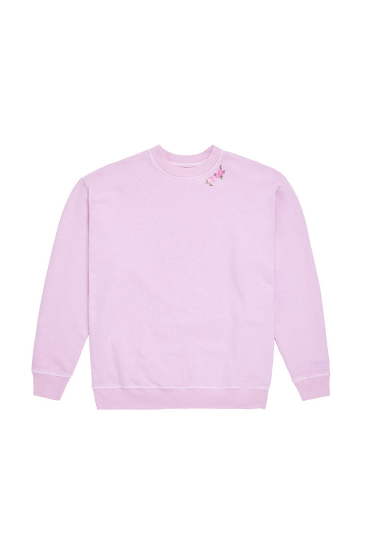 Lavender crewneck pullover sweatshirt with small floral chest graphic