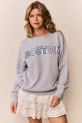 Palo Location pullover in light blue with 'BOSTON' graphic on crewneck