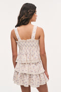 Back view: antique vanilla floral cotton top with lace-trim straps and tiered hem