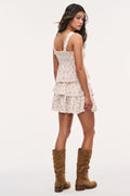 Antique vanilla floral cotton top worn with tiered ruffle hem and lace-trim straps