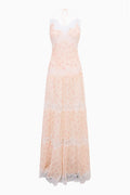 Floral maxi dress with spaghetti straps, lace trim, and tiered sheer skirt in soft pink