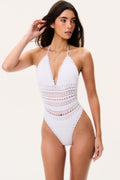 Off-white crochet one-piece swimsuit with deep V neckline and scalloped edges, tie straps