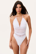Off-white crochet one-piece swimsuit with V-neck, openwork midsection, and scalloped trim
