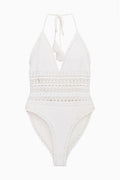 Off-white crochet one-piece swimsuit, halter tie straps, open back, and scalloped trim
