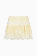 Kellison light yellow lace mini skirt, flat lay with scalloped tiered hem