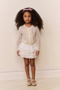 Front view: girls knit alpaca-wool cardigan in white with textured panel detail