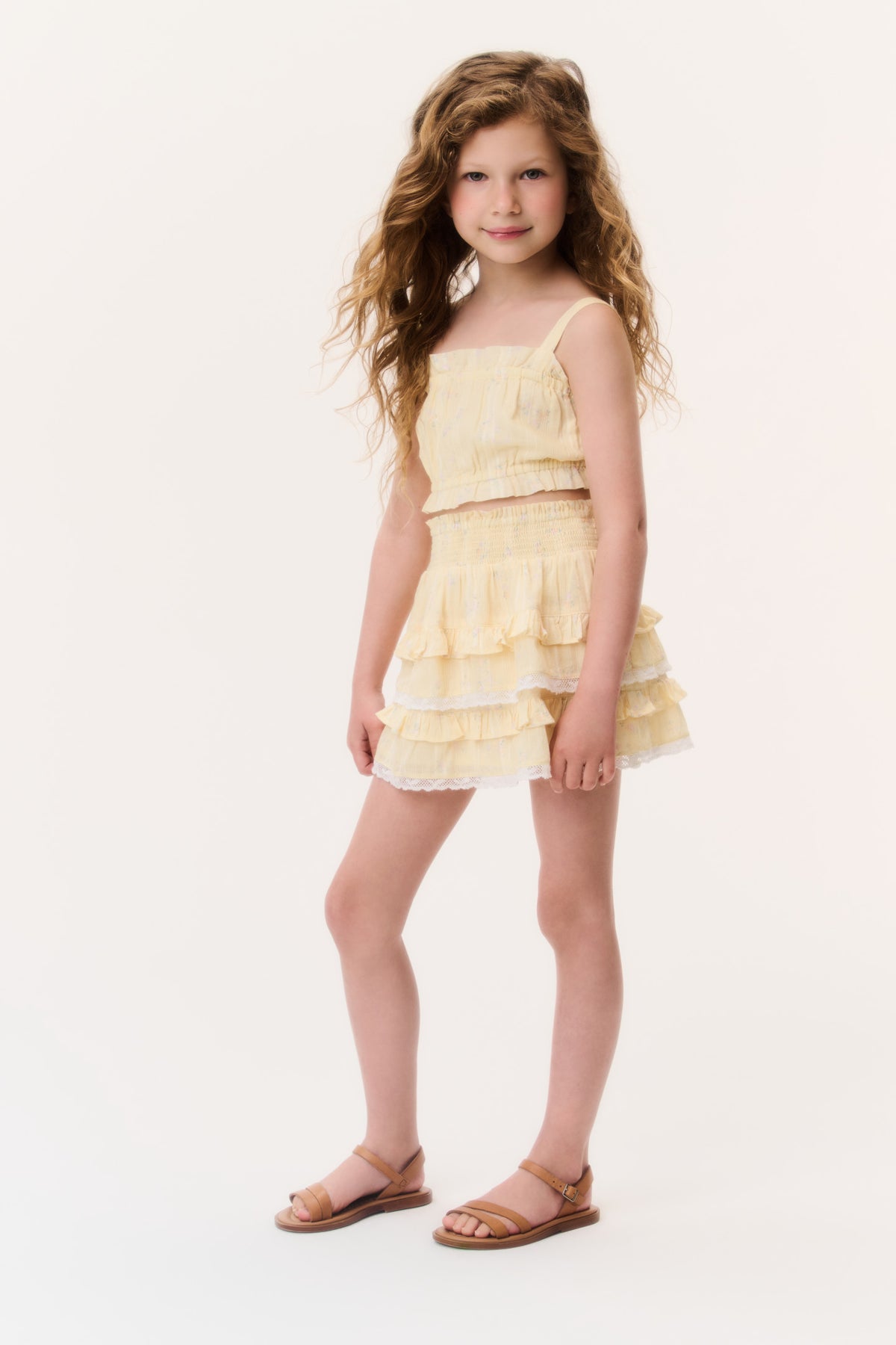 Girls pale yellow tiered ruffle mini skirt, elastic waist