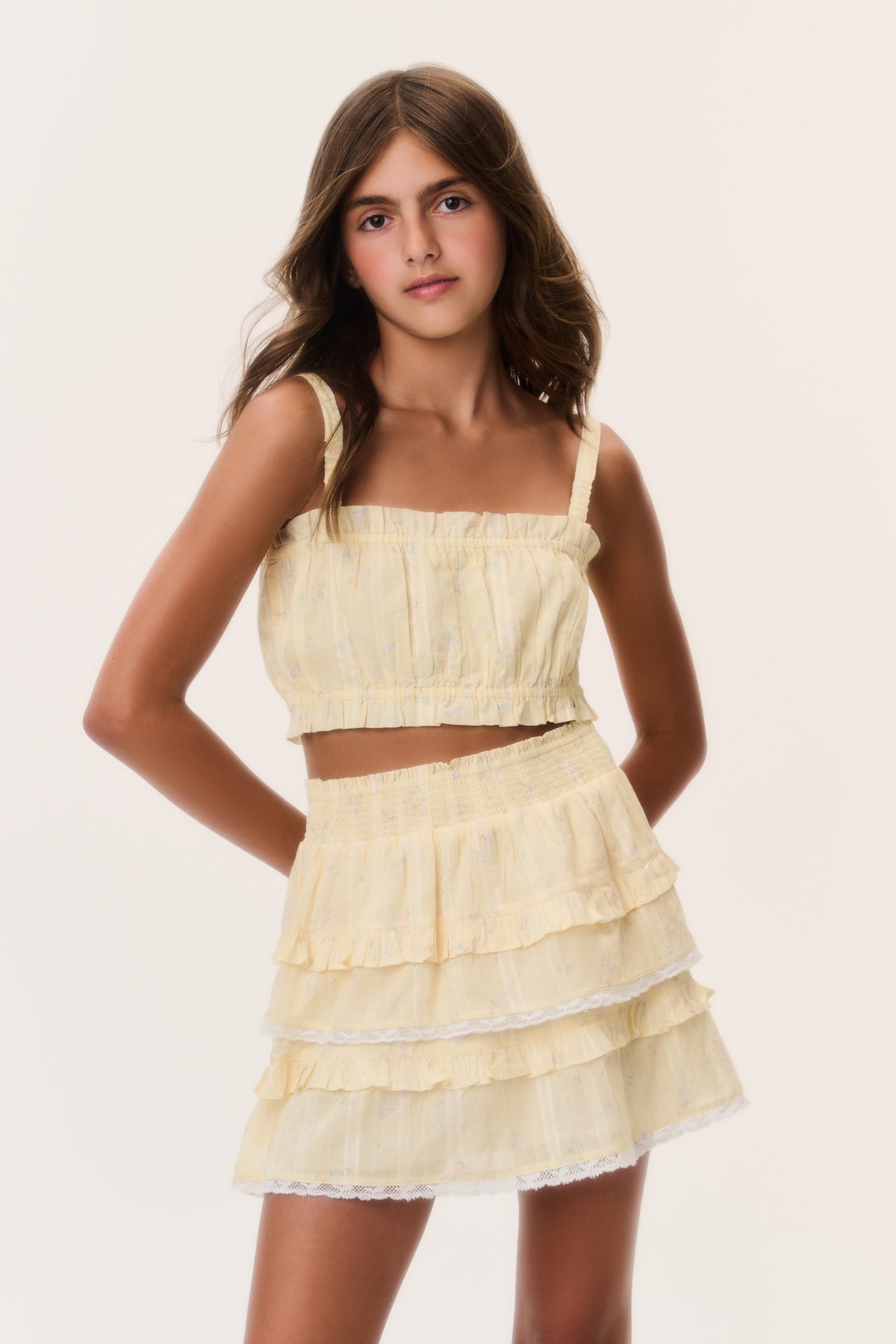 Lemon yellow tiered ruffle mini skirt with ditsy floral print and elastic waist