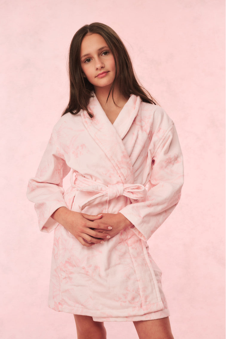 Kids cotton bath robe, pale pink patterned fabric, hood with tie belt at waist.