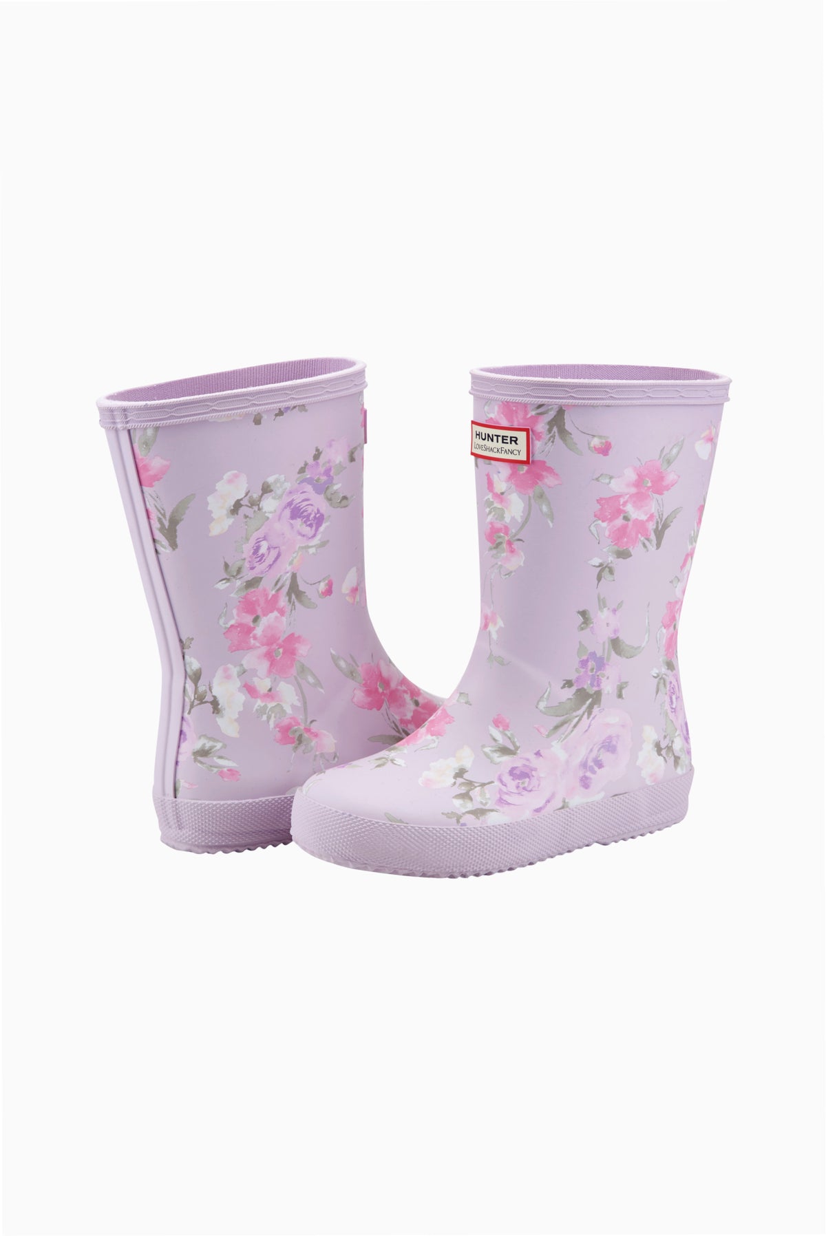 Pair of kids classic rain boots in light lavender with pink floral pattern.