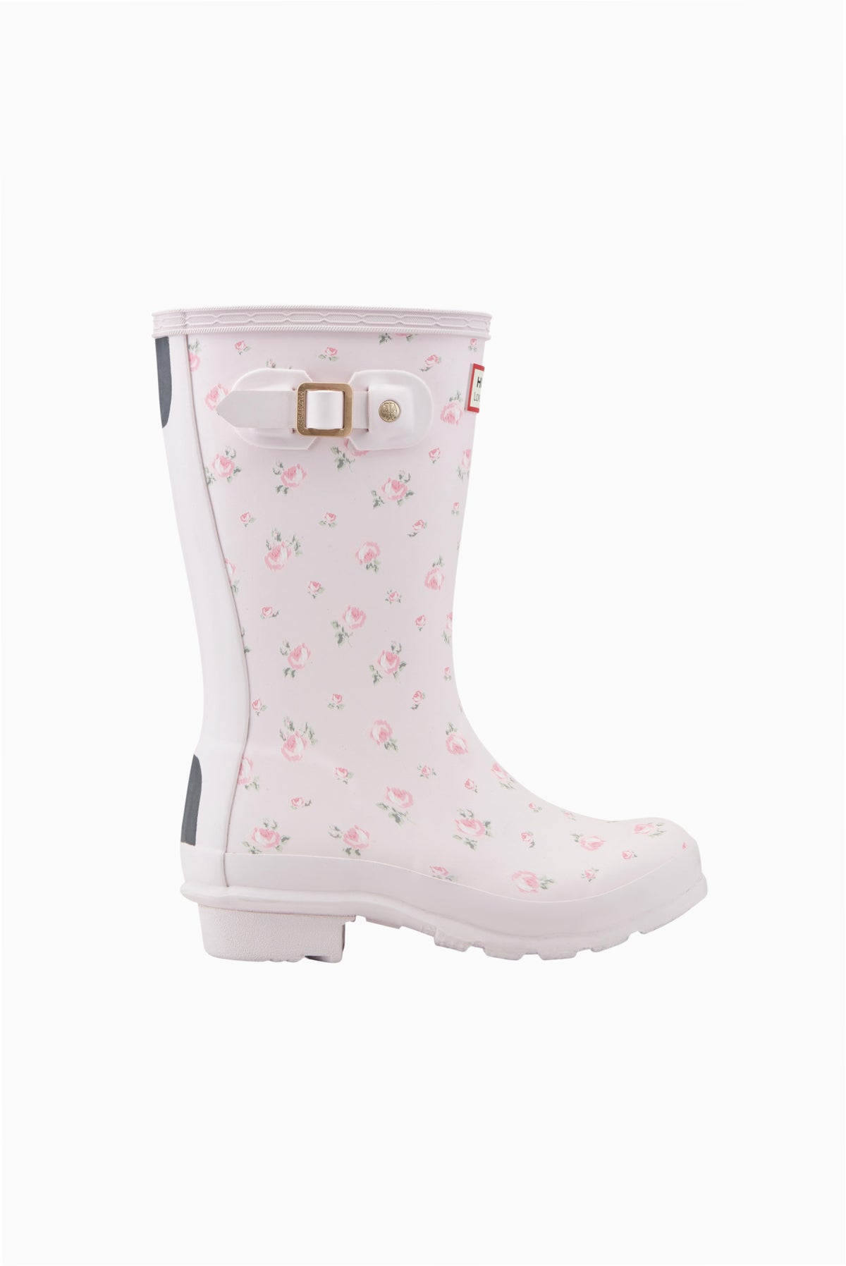 Kids short rain boot in white with pink floral print, side view with buckle