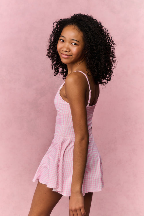 Pink gingham tween active dress with spaghetti straps and flared skirt