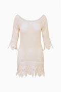 Ivory crochet mini dress with boat neckline and scalloped hem, fitted sleeves