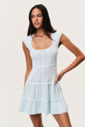 Dusty lagoon blue pointelle mini dress with sleeveless scoop neck and tiered ruffle layers
