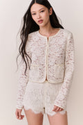 Ivory lace mini shorts with scalloped edges and floral lace, front view
