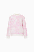 Pink girls pullover with heart print, long sleeves, and crew neck