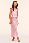 Pink floral peplum top with ruffle trim and off-shoulder neckline