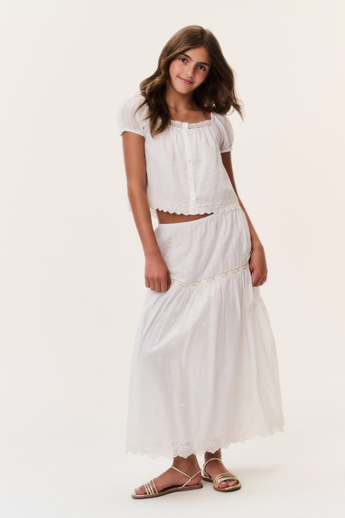Ivory cotton lace tiered skirt for girls, front view with scalloped hem detail