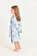 Kids cotton bath robe, light blue floral print, side view with tie belt.