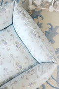 Printed dog bed inner bolster detail in light blue floral print with rounded edges