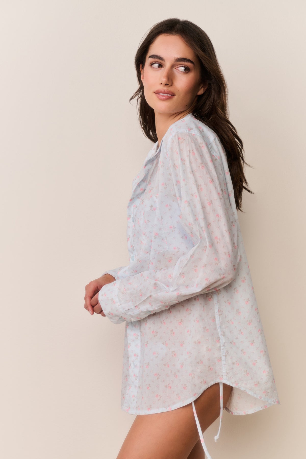 Unisex floral cotton shirt in light blue, side view with long sleeve and side slit