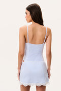 Light blue gingham swim skirt with scalloped lace hem, back view