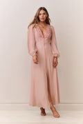 Light pink silk maxi dress with lace V-neck and button trim, sheer puff sleeves
