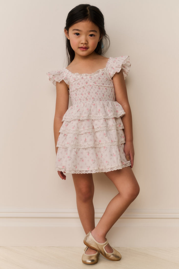 Girls' ivory floral cotton dress with tiered skirt ruffles and cap sleeves