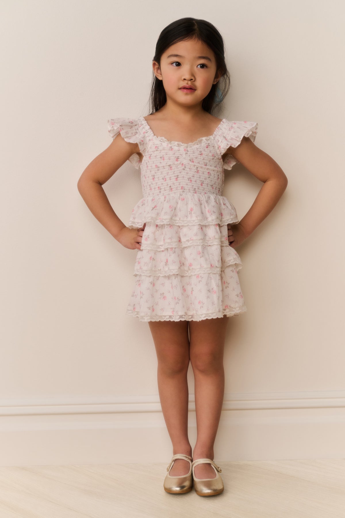 Girls' ivory floral cotton dress with layered ruffles and cap sleeves